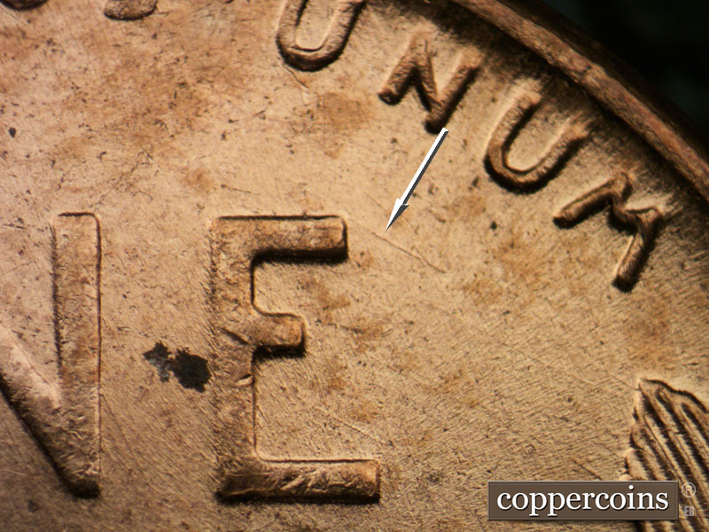 Die-stage B marker on 1957D•1DO•029 (1957 Doubled Die Obverse).