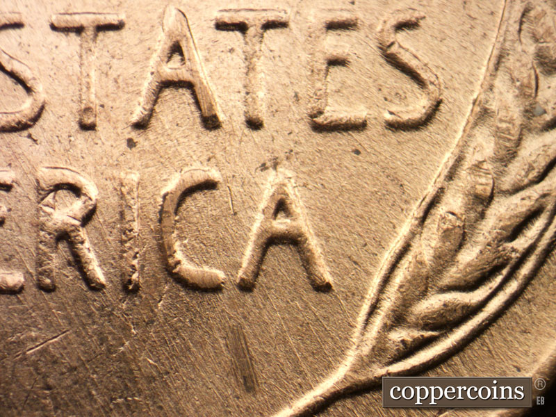 Die-stage B marker on 1957D•1DO•029 (1957 Doubled Die Obverse).