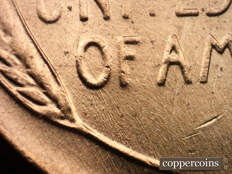 Die-stage B marker on 1957D•1DO•029 (1957 Doubled Die Obverse).