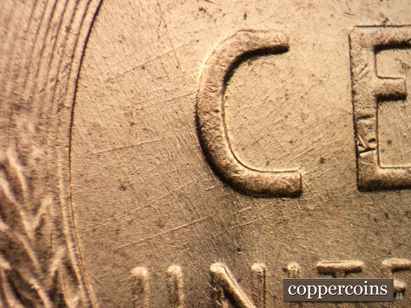 Die-stage B marker on 1957D•1DO•029 (1957 Doubled Die Obverse).