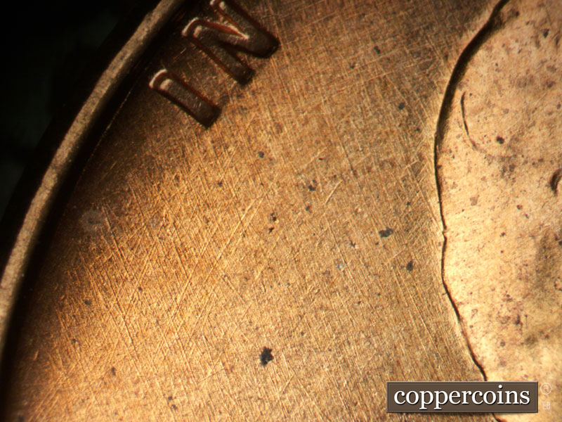 Die-stage B marker on 1957D•1DO•030 (1957 Doubled Die Obverse).