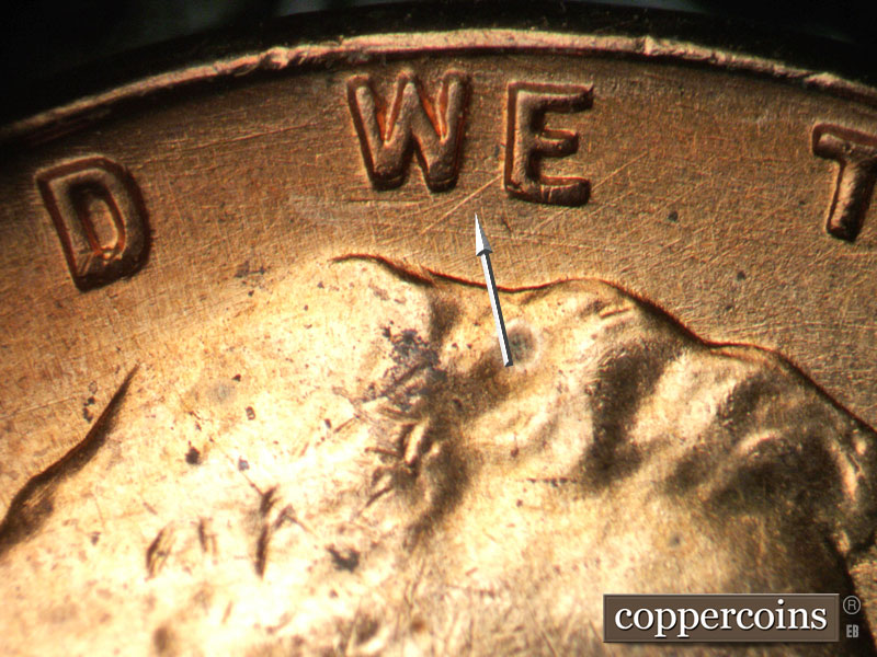 Die-stage B marker on 1957D•1DO•030 (1957 Doubled Die Obverse).