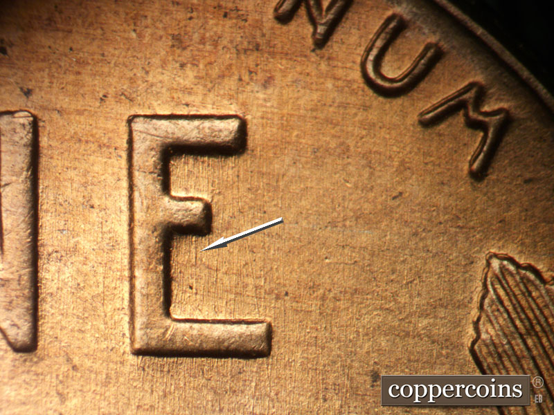 Die-stage B marker on 1957D•1DO•030 (1957 Doubled Die Obverse).