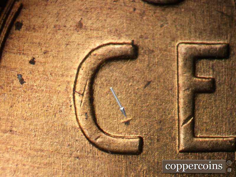 Die-stage B marker on 1957D•1DO•030 (1957 Doubled Die Obverse).