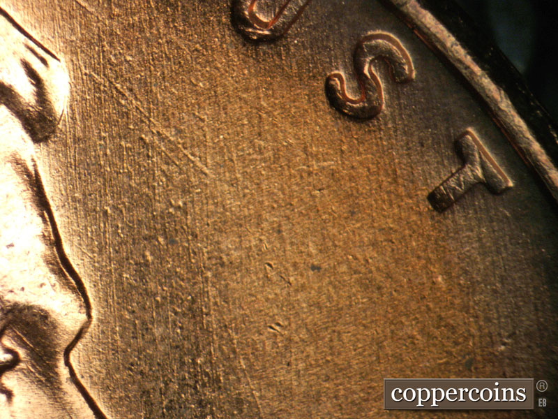 Die-stage B marker on 1957D•1DO•031 (1957 Doubled Die Obverse).