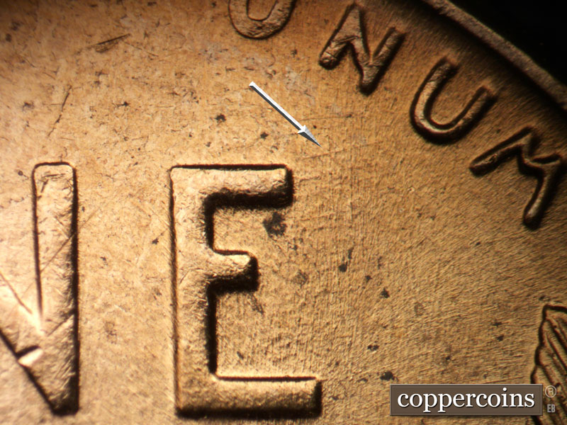 Die-stage B marker on 1957D•1DO•031 (1957 Doubled Die Obverse).