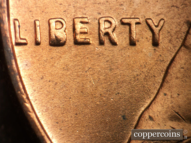 Die-stage C marker on 1957D•1DO•031 (1957 Doubled Die Obverse).