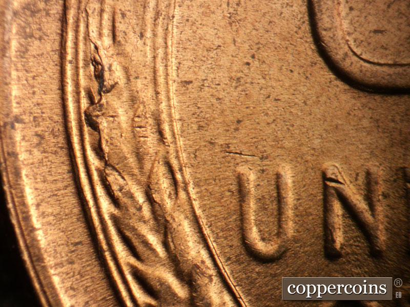 Die-stage C marker on 1957D•1DO•031 (1957 Doubled Die Obverse).