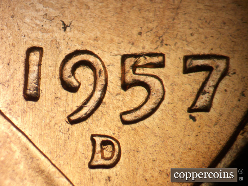 Die-stage B marker on 1957D•1DO•032 (1957 Doubled Die Obverse).