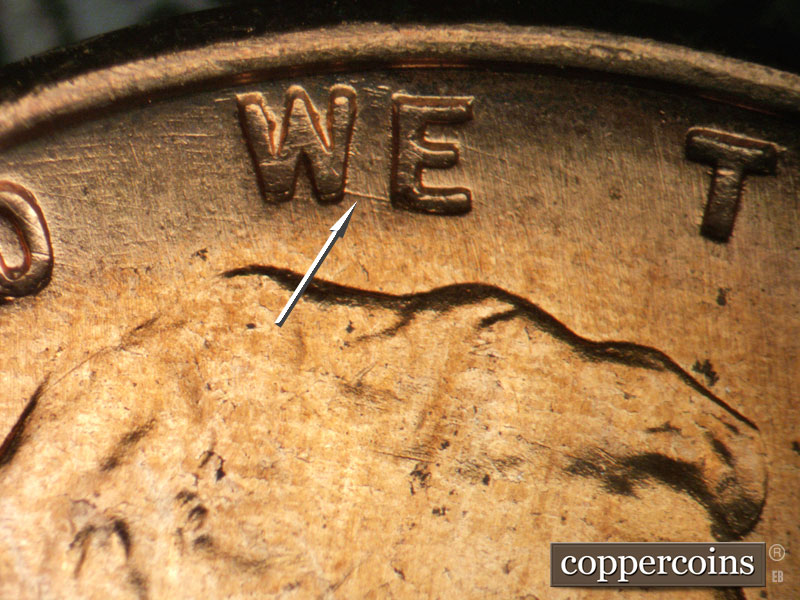 Die-stage B marker on 1957D•1DO•032 (1957 Doubled Die Obverse).