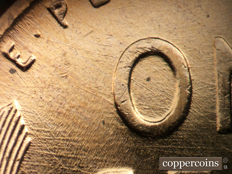 Die-stage A marker on 1957D•1DO•033 (1957 Doubled Die Obverse).
