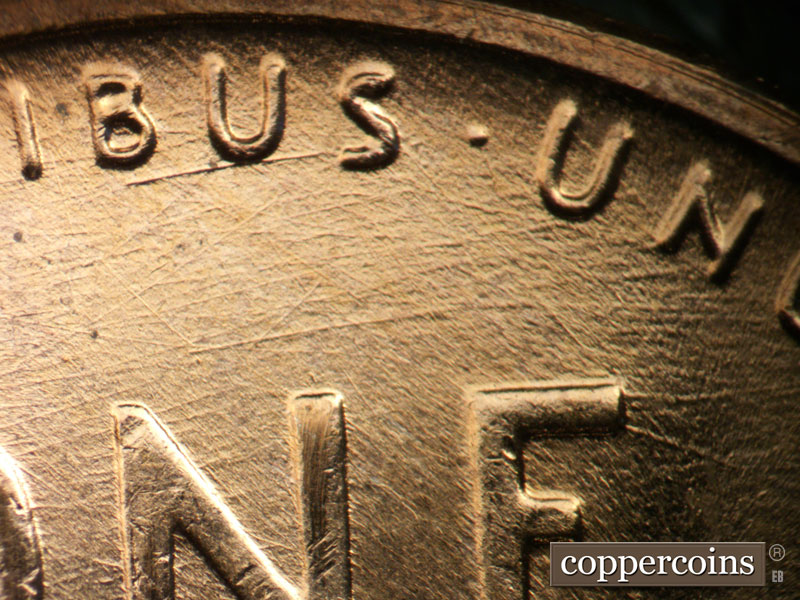 Die-stage A marker on 1957D•1DO•033 (1957 Doubled Die Obverse).
