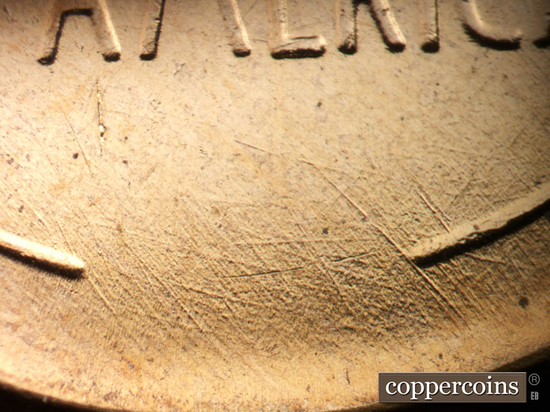 Die-stage A marker on 1957D•1DO•033 (1957 Doubled Die Obverse).
