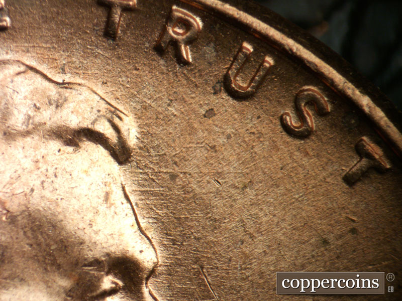 Die-stage B marker on 1957D•1DO•033 (1957 Doubled Die Obverse).
