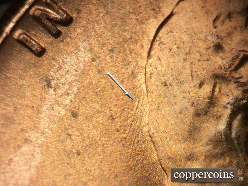 Die-stage B marker on 1957D•1DO•034 (1957 Doubled Die Obverse).