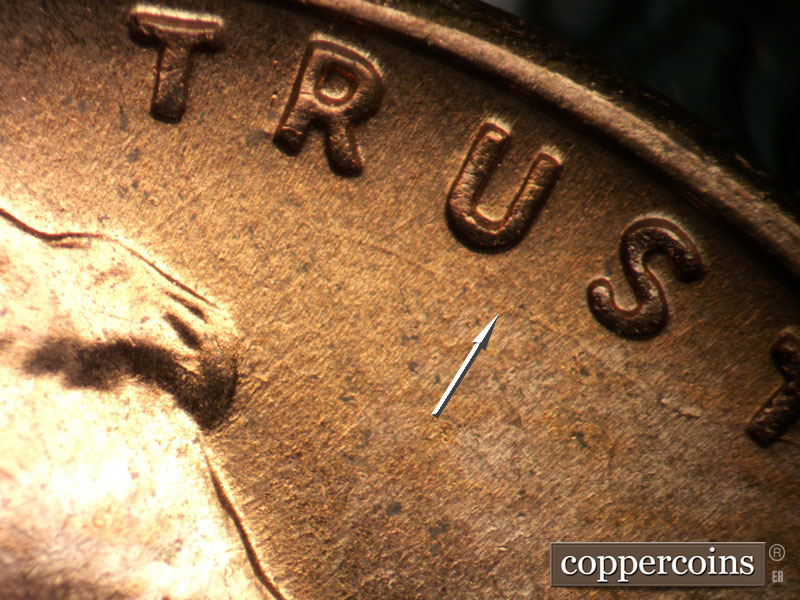 Die-stage B marker on 1957D•1DO•034 (1957 Doubled Die Obverse).
