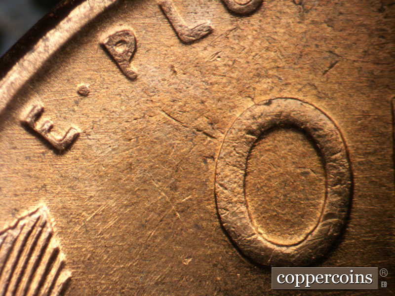 Die-stage B marker on 1957D•1DO•034 (1957 Doubled Die Obverse).