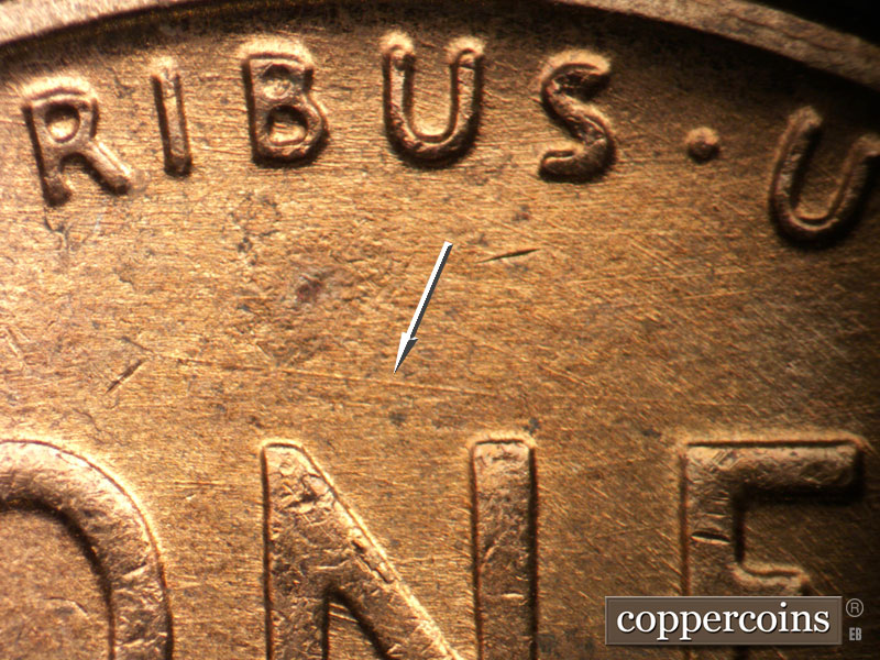 Die-stage B marker on 1957D•1DO•034 (1957 Doubled Die Obverse).