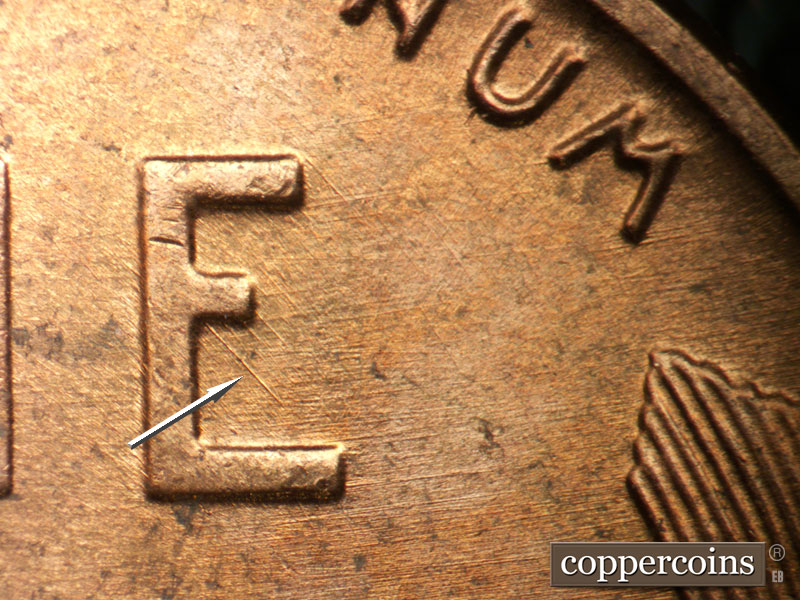 Die-stage B marker on 1957D•1DO•034 (1957 Doubled Die Obverse).