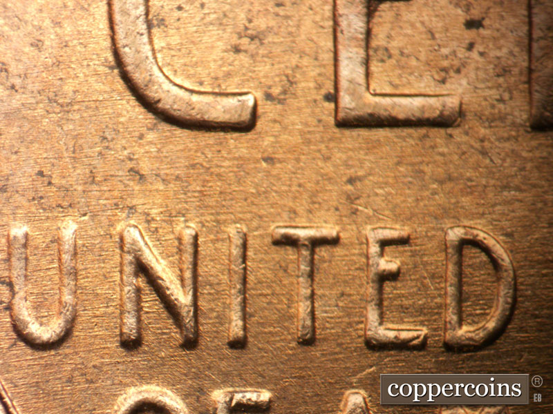 Die-stage B marker on 1957D•1DO•034 (1957 Doubled Die Obverse).