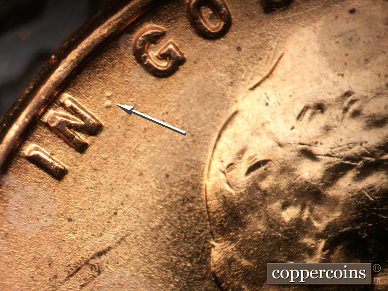 Die-stage B marker on 1957D•1DO•035 (1957 Doubled Die Obverse).