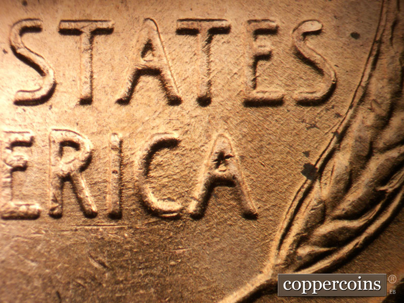 Die-stage B marker on 1957D•1DO•035 (1957 Doubled Die Obverse).