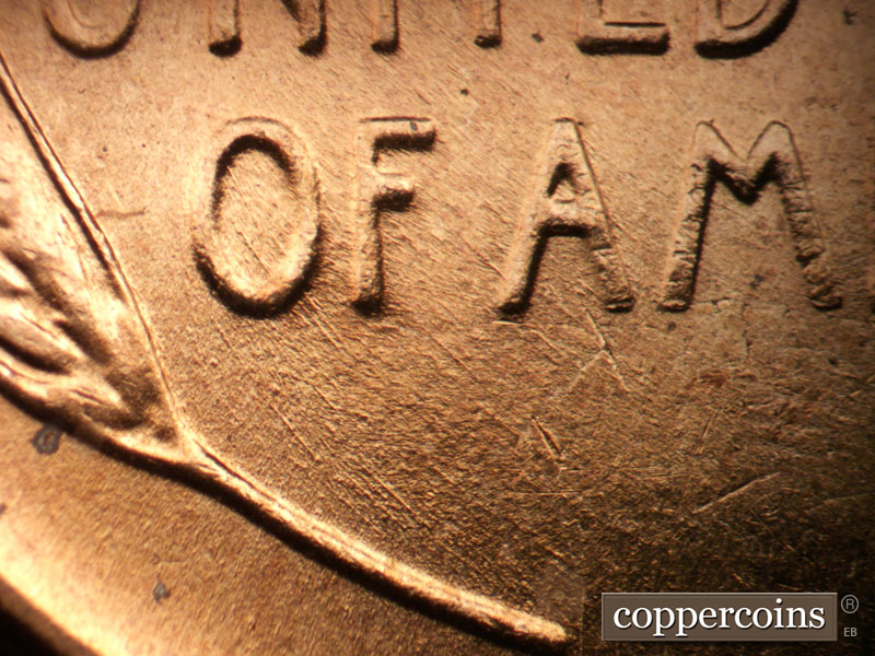 Die-stage B marker on 1957D•1DO•035 (1957 Doubled Die Obverse).