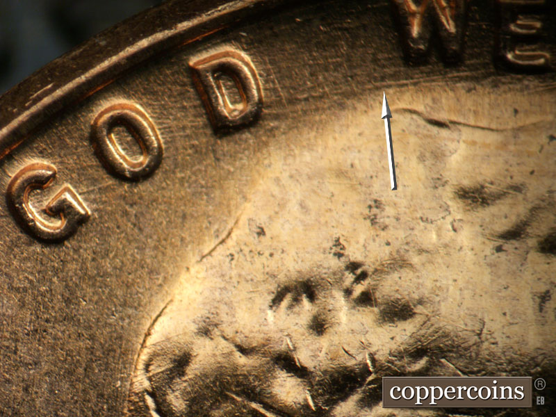 Die-stage B marker on 1957D•1DO•036 (1957 Doubled Die Obverse).