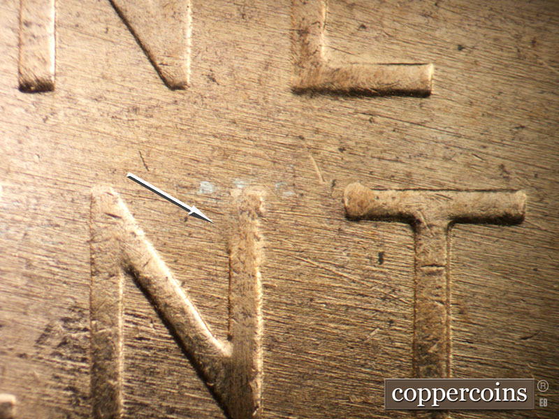 Die-stage B marker on 1957D•1DO•036 (1957 Doubled Die Obverse).