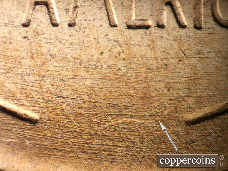 Die-stage B marker on 1957D•1DO•036 (1957 Doubled Die Obverse).