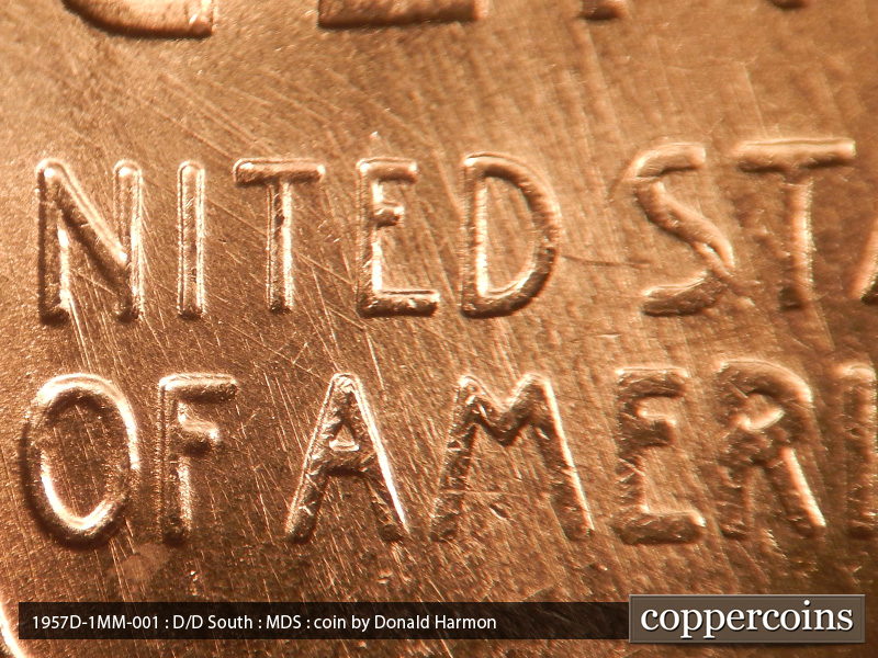 Die-stage B marker on 1957D•1MM•001 (1957 Repunched Mint Mark).