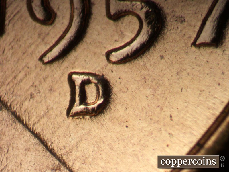 Die-stage C marker on 1957D•1MM•001 (1957 Repunched Mint Mark).