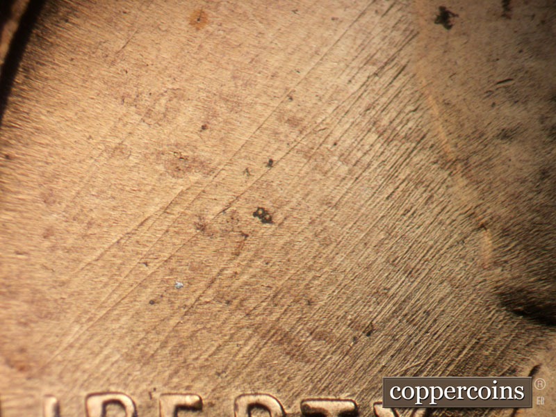 Die-stage C marker on 1957D•1MM•001 (1957 Repunched Mint Mark).