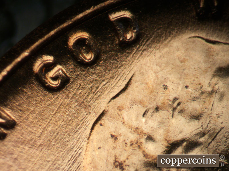 Die-stage C marker on 1957D•1MM•001 (1957 Repunched Mint Mark).