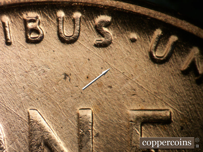Die-stage C marker on 1957D•1MM•001 (1957 Repunched Mint Mark).