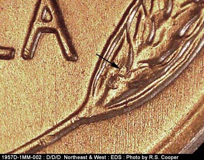 Die-stage A marker on 1957D•1MM•002 (1957 Repunched Mint Mark).