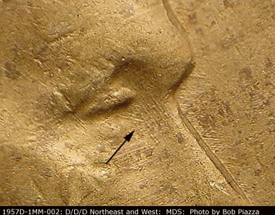 Die-stage B marker on 1957D•1MM•002 (1957 Repunched Mint Mark).