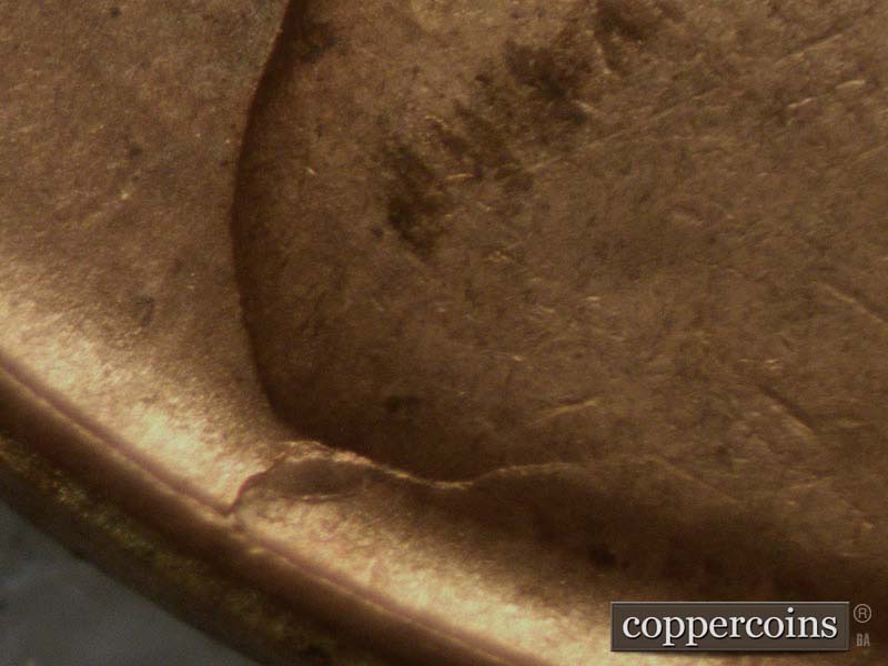 Die-stage C marker on 1957D•1MM•002 (1957 Repunched Mint Mark).