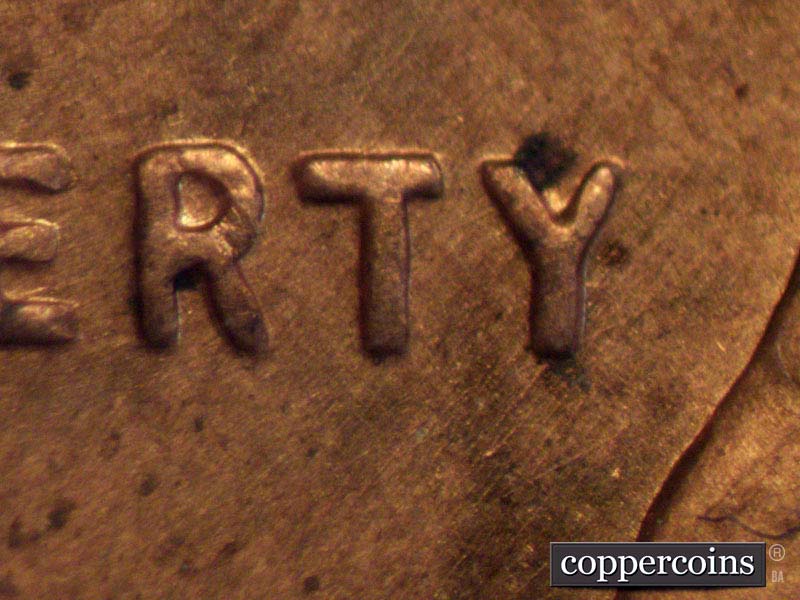 Die-stage C marker on 1957D•1MM•002 (1957 Repunched Mint Mark).