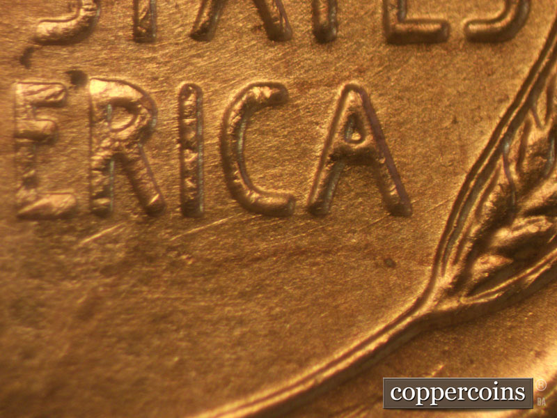 Die-stage A marker on 1957D•1MM•003 (1957 Repunched Mint Mark).