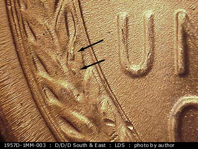 Die-stage C marker on 1957D•1MM•003 (1957 Repunched Mint Mark).