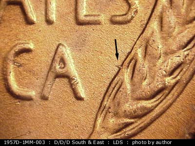 Die-stage C marker on 1957D•1MM•003 (1957 Repunched Mint Mark).
