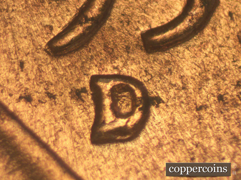Die-stage A marker on 1957D•1MM•004 (1957 Repunched Mint Mark).