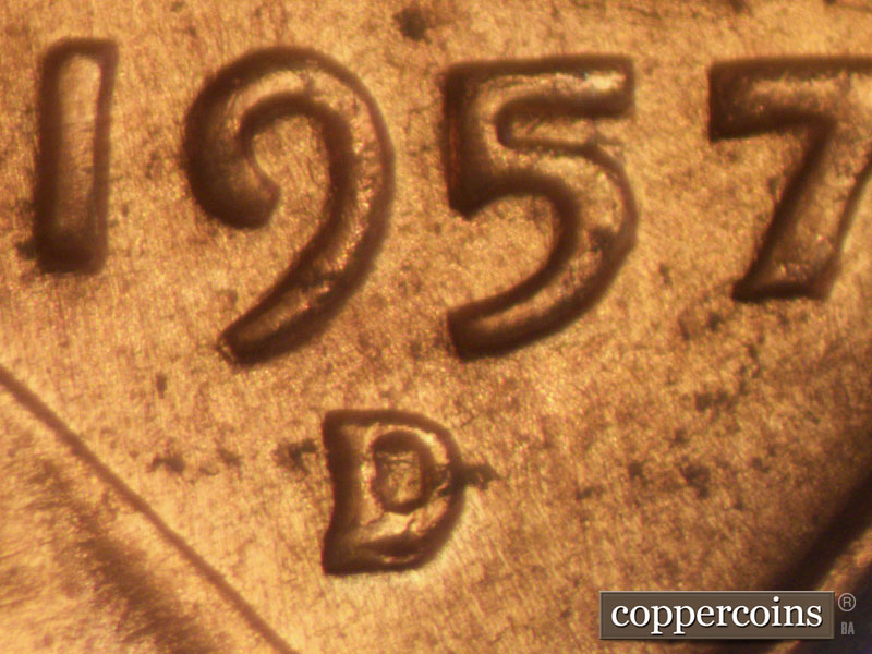 Die-stage A marker on 1957D•1MM•004 (1957 Repunched Mint Mark).