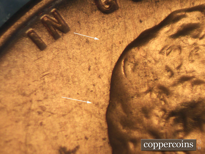 Die-stage A marker on 1957D•1MM•004 (1957 Repunched Mint Mark).