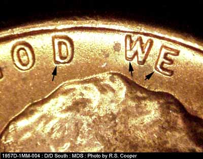 Die-stage B marker on 1957D•1MM•004 (1957 Repunched Mint Mark).