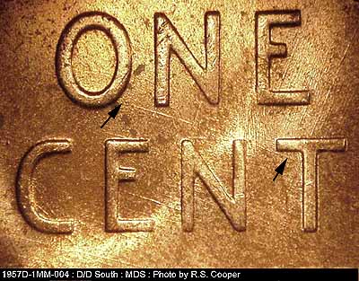 Die-stage B marker on 1957D•1MM•004 (1957 Repunched Mint Mark).