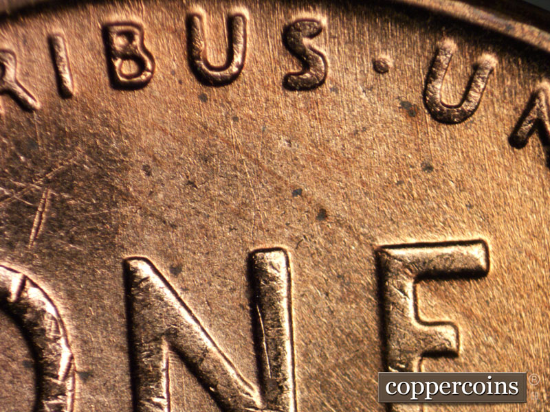 Die-stage B marker on 1957D•1MM•005 (1957 Repunched Mint Mark).