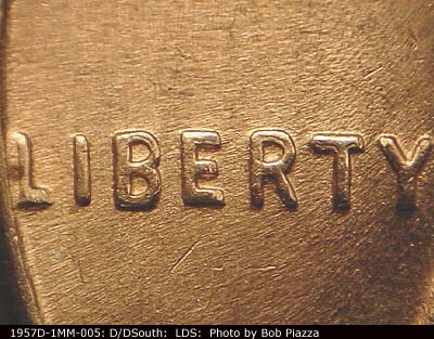 Die-stage C marker on 1957D•1MM•005 (1957 Repunched Mint Mark).