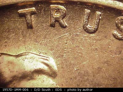 Die-stage A marker on 1957D•1MM•006 (1957 Repunched Mint Mark).